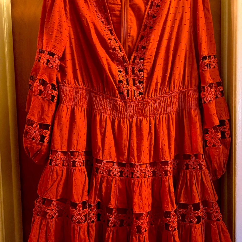 Beautiful tiered Rust colored dress. Fun party dress with full bishop sleeves